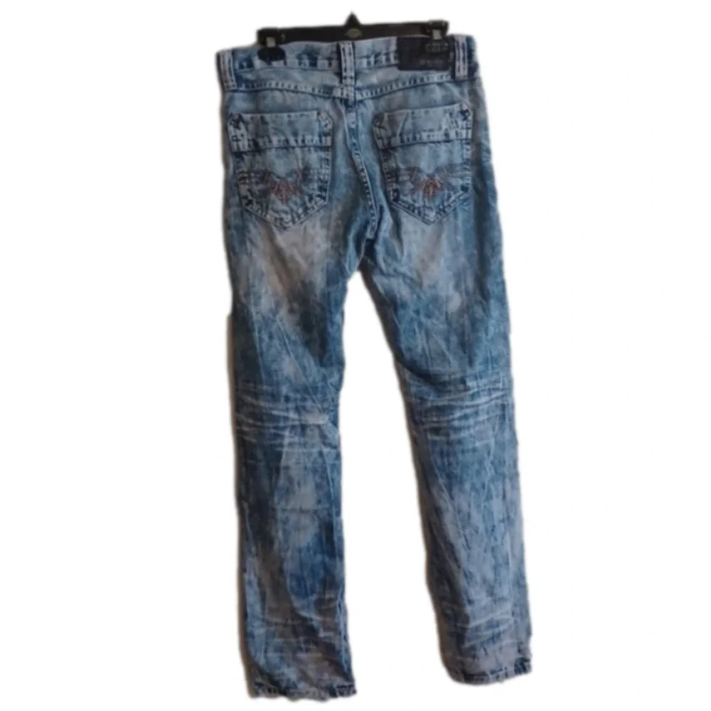 Black brand super distressed, acid wash looking jeans.Size 30x32.